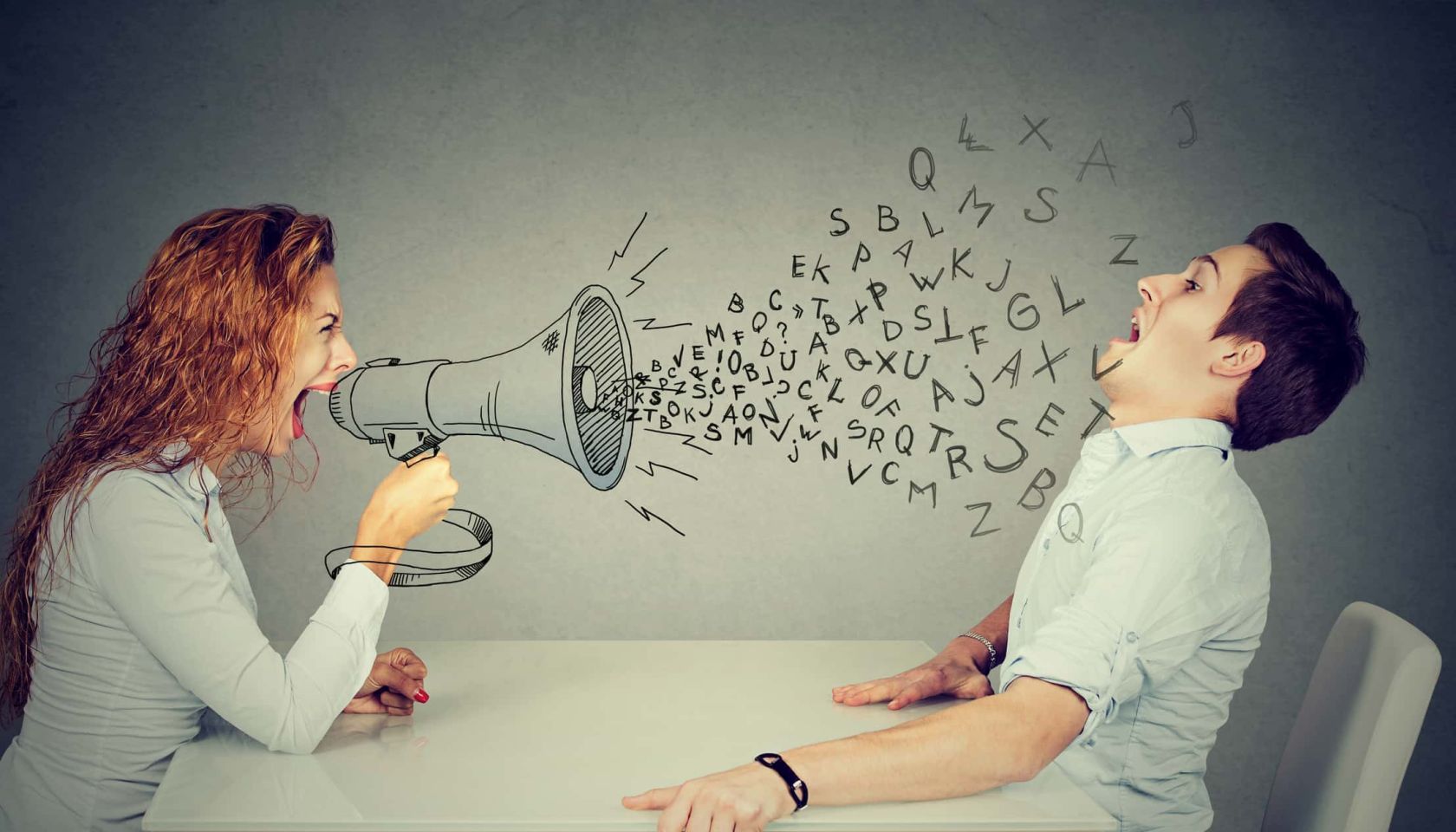 angry young woman with megaphone shouting at stressed scared man blown away by wave of alphabet letters