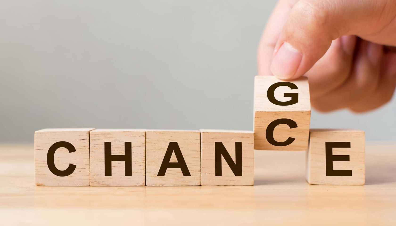 Hand flip wooden cube with word "change" to "chance", Personal development and career growth or change yourself concept