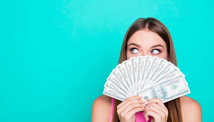 girl with fanned out money