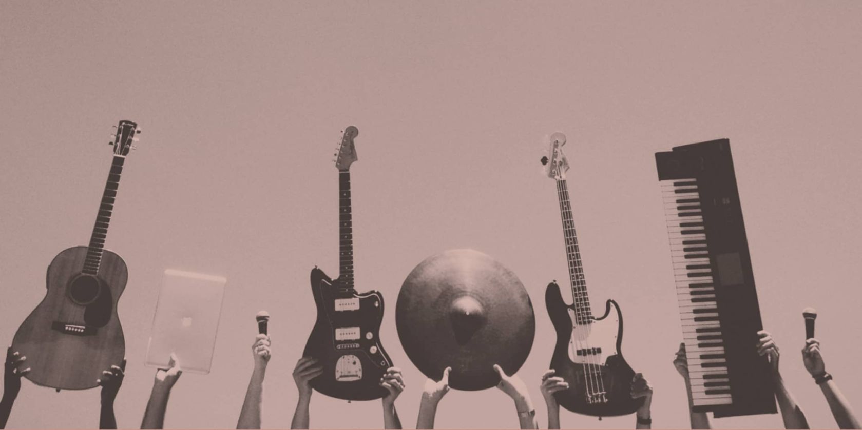 pink instruments, guitars, microphone, and piano held in the air