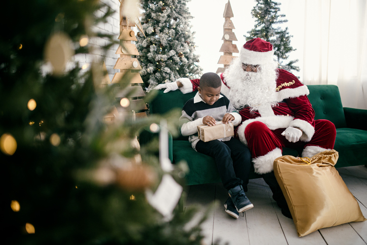 Black Santa Claus Meeting Children