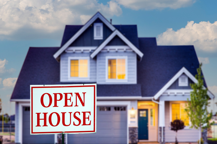 House for Sale with Open House Sign