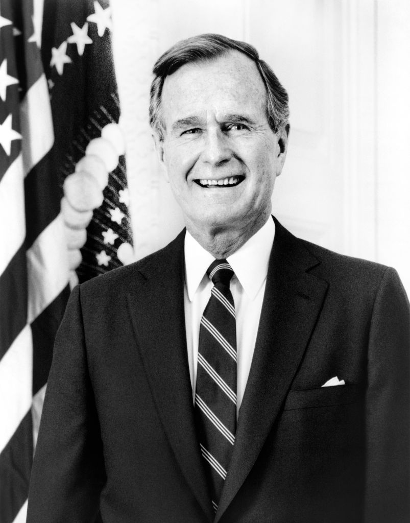 U.S. President George H.W. Bush, half-length Portrait next to American Flag, Washington, D.C., USA, David Valdez, 1989