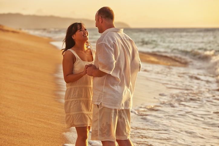 Romantic Couple on Hawaiian Beach at Sunset