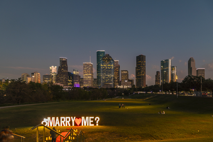 Romantic Proposal with Houston Skyline at Night