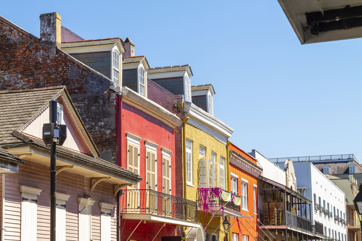 New Orleans, Louisiana in Mardi Gras Carnival Celebrations. Colorful buildings in the French Quarter during Mardi Gras in New Orleans