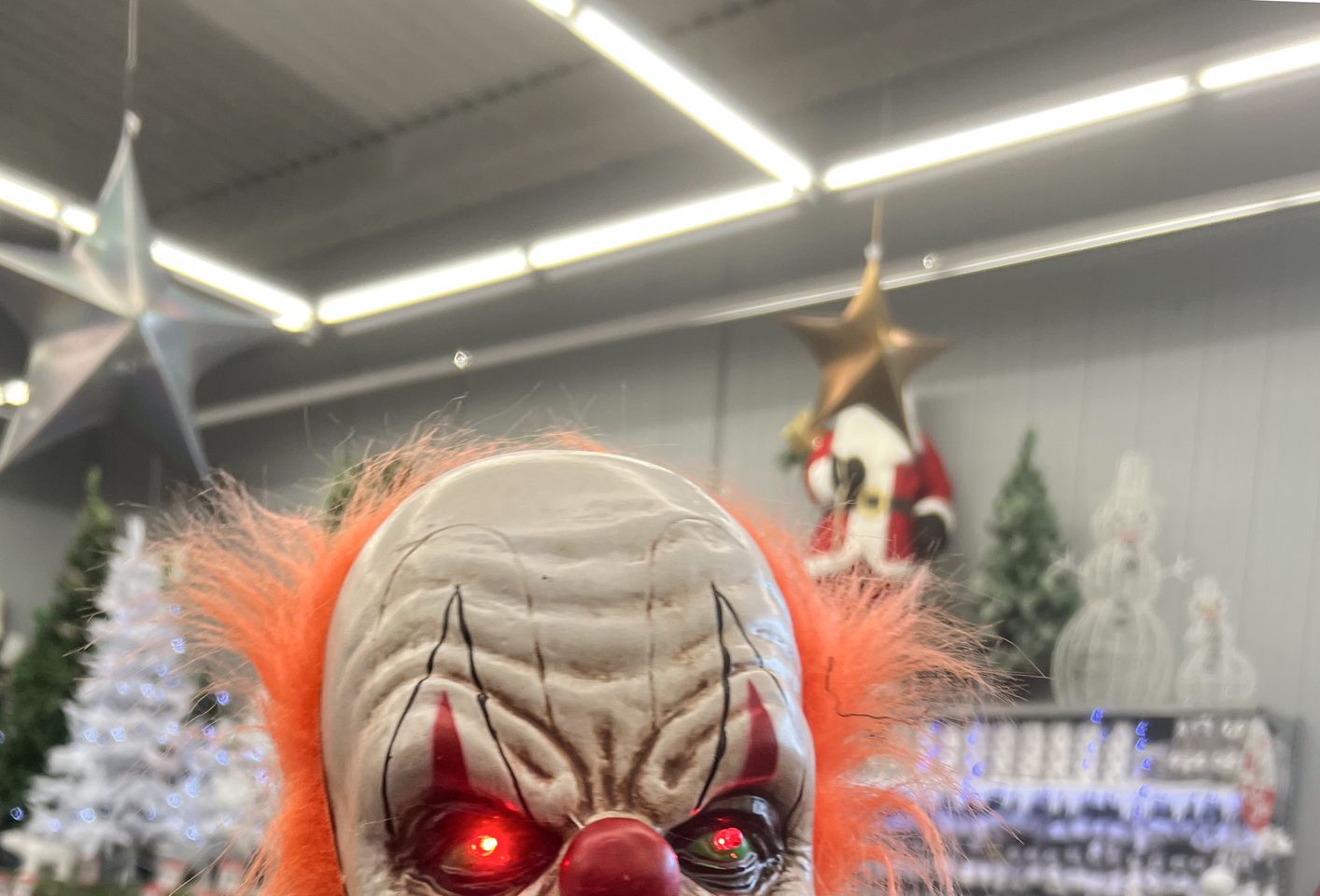 Scary clown Zombie in a shop Halloween Costume Store